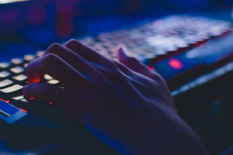 photo of person typing on computer keyboard 735911 scaled