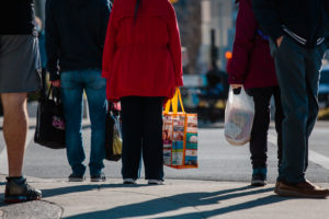 People holding shopping bags